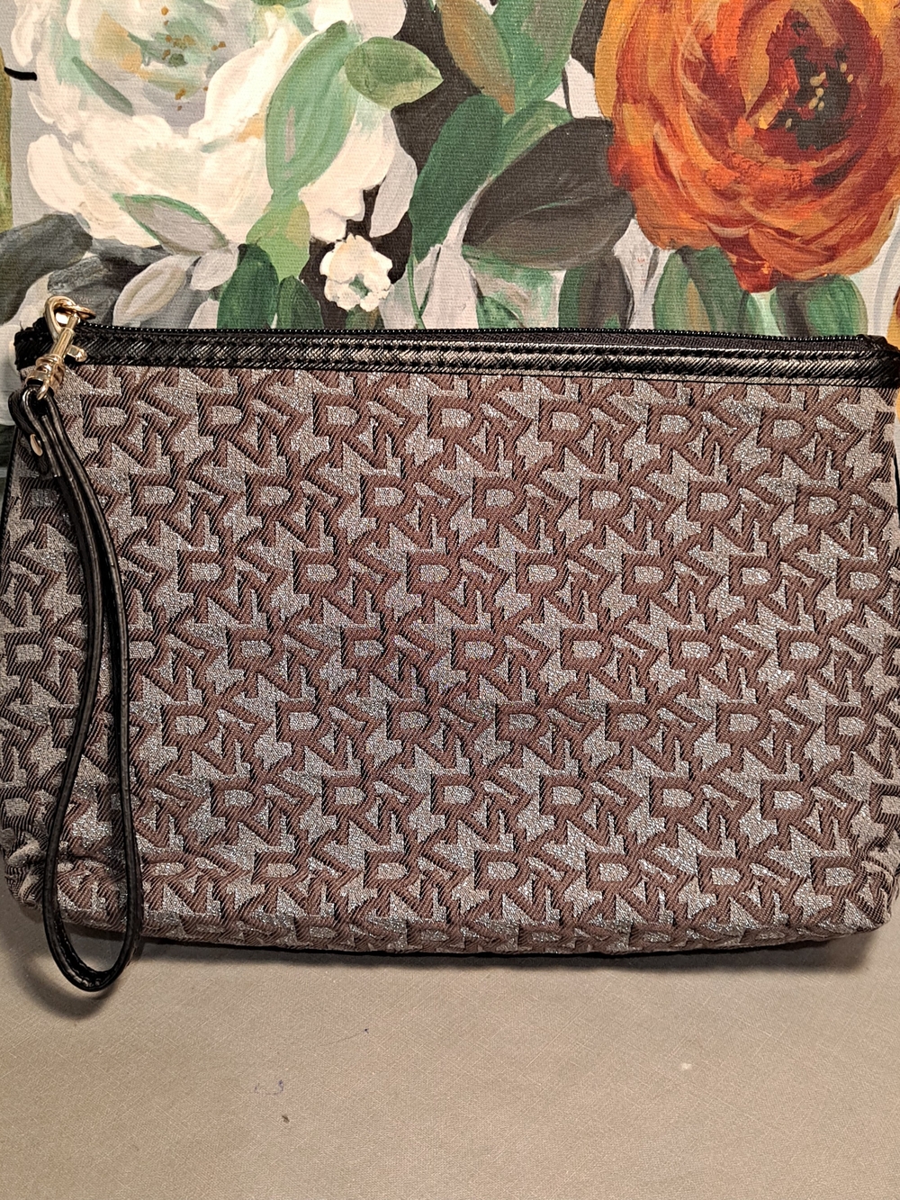 DKNYC Brown Raised Monogram Logo Wristlet Clutch Silver Metallic Base Black Trim